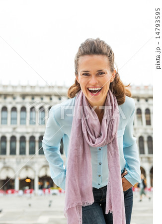 Portrait of happy young woman on piazza san marco in venice, ita 14793595