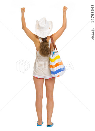 Full length portrait of beach young woman rejoicing success . re Full length portrait of beach young woman rejoicing success . re 14793643