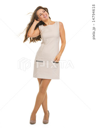 Full length portrait of smiling young woman 14794618