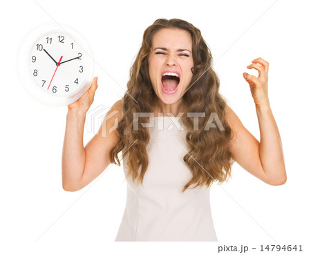 Stressed young woman with clock 14794641