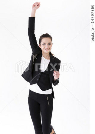 Successful business woman celebrating and dancing for joy. 14797366