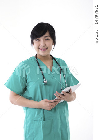 Female Asian doctor wearing a green scrubs and stethoscope 14797651