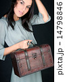 Woman with suitcase 14798846