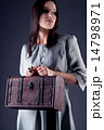 Woman with case 14798971