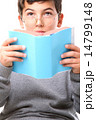 Boy reading a book 14799148