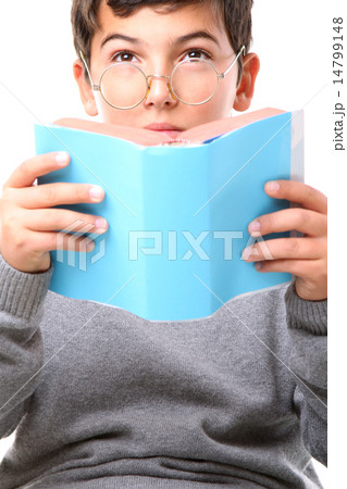 Boy reading a book 14799148