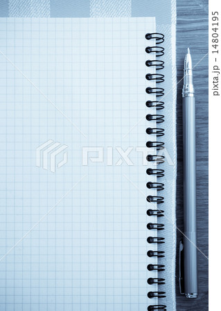 checked notebook on wood checked notebook on wood 14804195