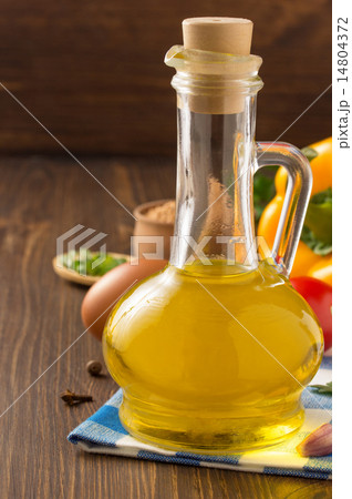 oil and food ingredients, spice on wood oil and food ingredients, spice on wood 14804372