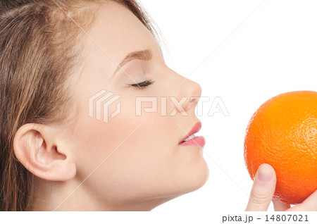 Woman with orange isolated white Woman with orange isolated white 14807021