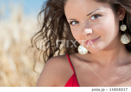 Woman in field on sunny summer day. 14808037