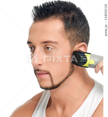 Cutting hairs of attractive man 14809226