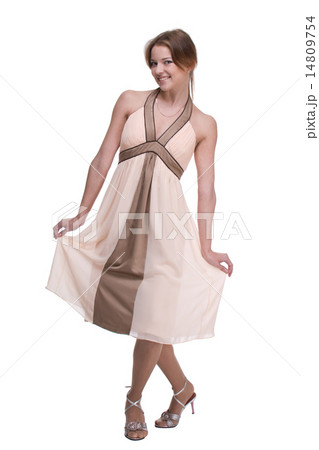 Beautiful dancing woman in light dress 14809754