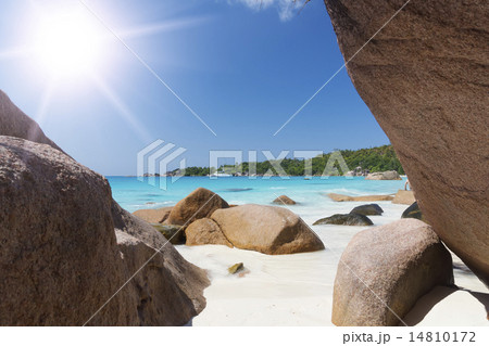White coral beach sand and azure indian ocean. White coral beach sand and azure indian ocean. 14810172