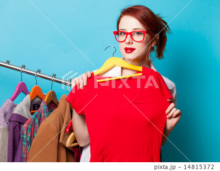 Young redhead designer with dress Young redhead designer with dress 14815372