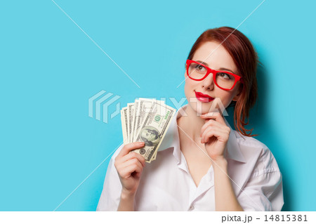 women in red glasses with money women in red glasses with money 14815381