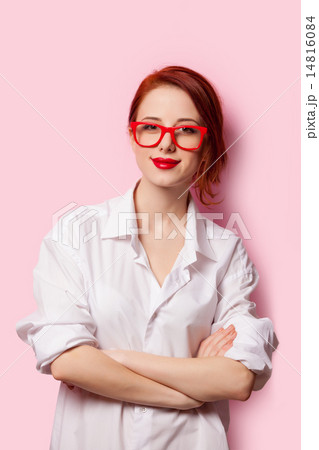 Smiling student girl in white shirt and red glasses Smiling student girl in white shirt and red glasses 14816084