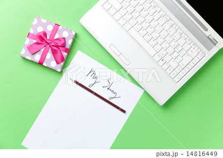 gift and paper near laptop gift and paper near laptop 14816449