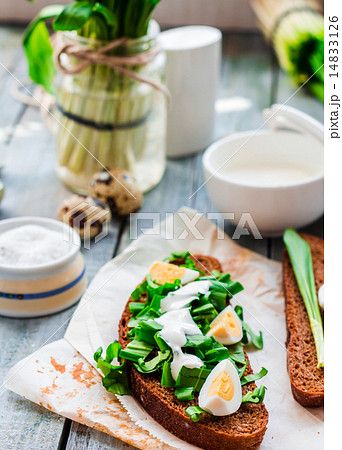 bread with wild garlic, sour cream and quail eggs bread with wild garlic, sour cream and quail eggs 14833126