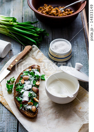 bread with wild garlic, sour cream and quail eggs 14833149