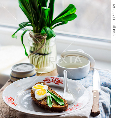 bread with wild garlic, sour cream and quail eggs bread with wild garlic, sour cream and quail eggs 14833164