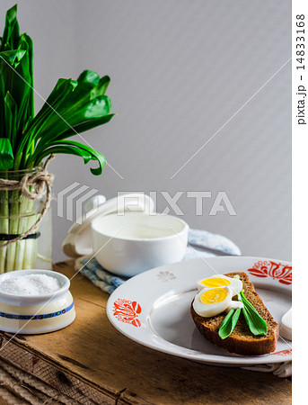 bread with wild garlic, sour cream and quail eggs 14833168