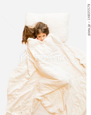 Isolated photo of girl lying in bed and covering with blanket 14835579