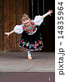 Dancing little girl acting on the stage 14835964