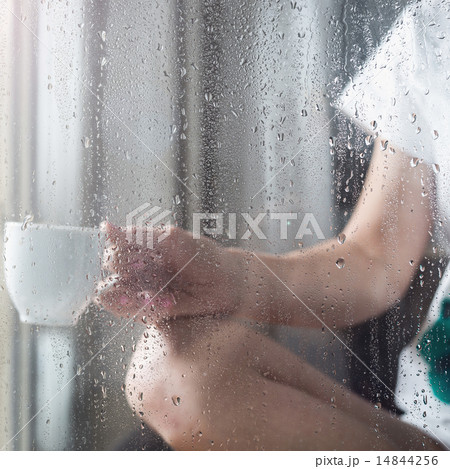 Young woman with cup Young woman with cup 14844256