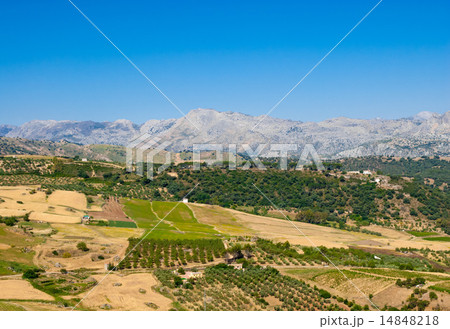 Rural hills ending at dry mountain range Rural hills ending at dry mountain range 14848218
