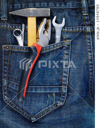 Instruments in a back pocket of a jeans 14848760