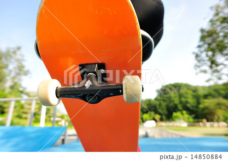 skateboarding woman legs at skatepark 14850884