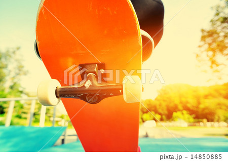 skateboarding woman legs at skatepark 14850885