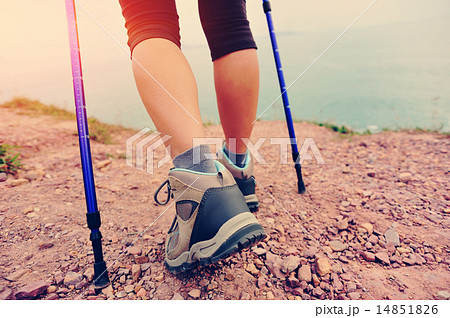 woman hiker hiking on seaside trail 14851826