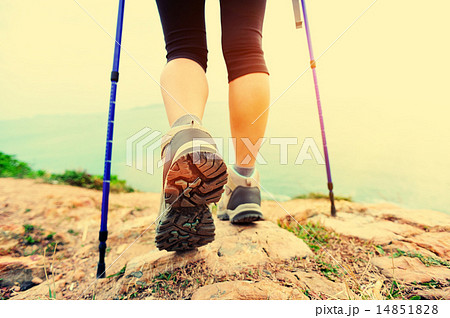 woman hiker hiking on seaside trail 14851828