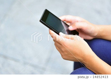 woman hands use smart phone in modern city woman hands use smart phone in modern city 14852413