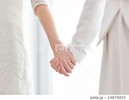 close up of happy married lesbian couple hugging close up of happy married lesbian couple hugging 14870935