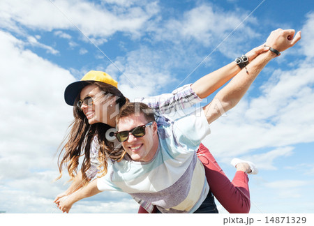 teenagers having fun outside 14871329