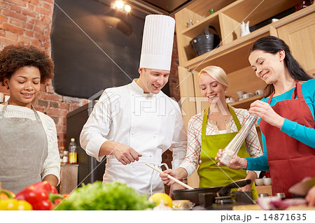 happy women and chef cook cooking in kitchen happy women and chef cook cooking in kitchen 14871635