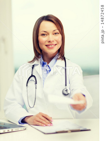 smiling doctor with laptop computer and clipboard 14872458
