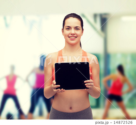 sporty woman with tablet pc blank screen sporty woman with tablet pc blank screen 14872526