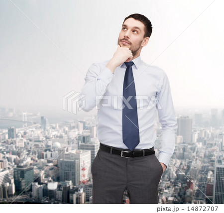 handsome businessman looking up handsome businessman looking up 14872707