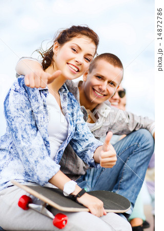 teenages with skateboard outside teenages with skateboard outside 14872786