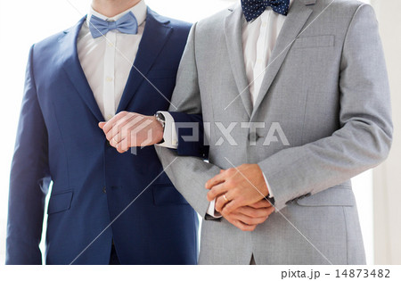close up of happy male gay couple holding hands 14873482
