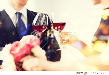 engaged couple with wine glasses 14873772
