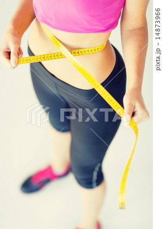 trained belly with measuring tape 14873966