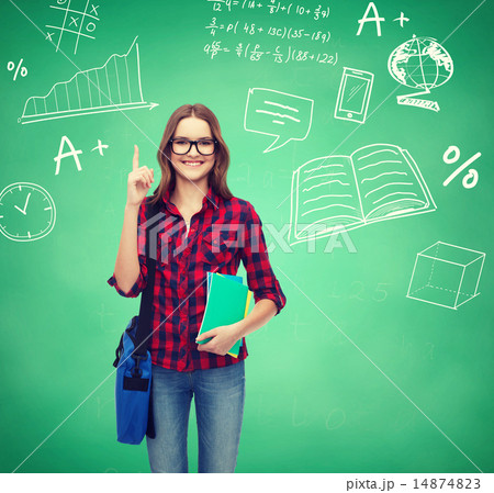 smiling student girl showing thumbs up 14874823