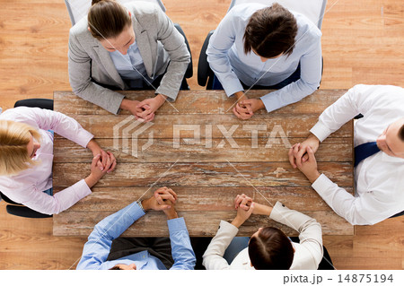 close up of business team sitting at table close up of business team sitting at table 14875194