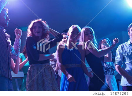 group of happy friends dancing in night club group of happy friends dancing in night club 14875295