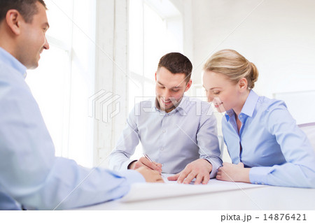 smiling business people meeting in office 14876421