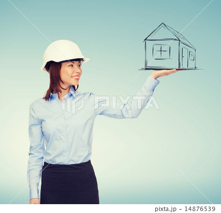 young smiling businesswoman in white helmet 14876539